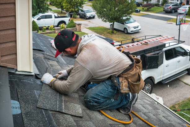 Professional Roofing technician working in Wolcottville, IN